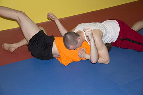students wrestling practicing jiujitsu